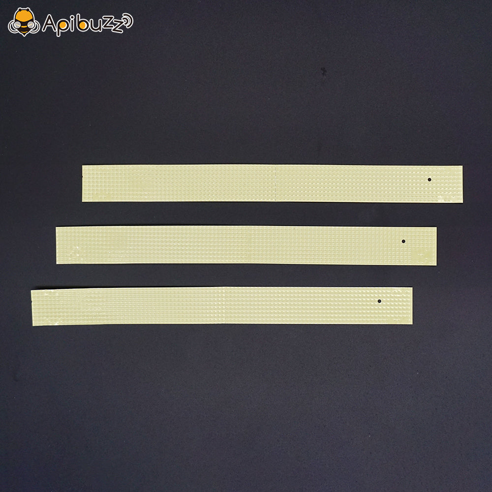 Opened APIFLUVA-PRO bee mite treatment pack showing plastic strips