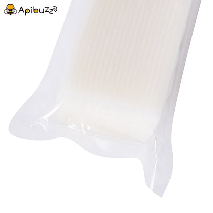 Close-up view of Meloxal strips in semi-transparent inner packaging, containing oxalic acid treatment for bees